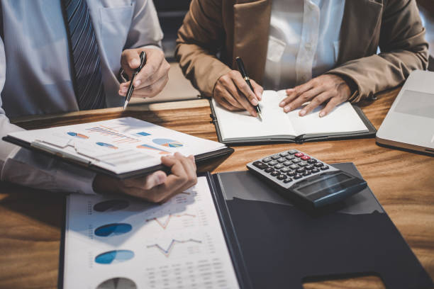 istock Business team colleague working with new startup project plan and discussion information for financial strategy with laptop, results of their successful teamwork 1129832773