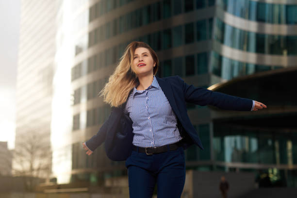 istock relaxed business woman 1129832981