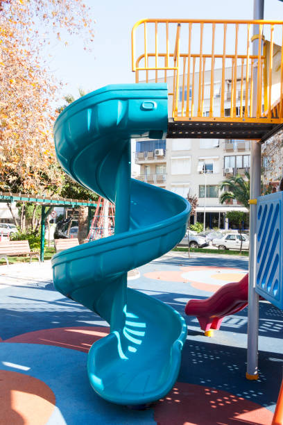 istock slide in children playground 1129833148