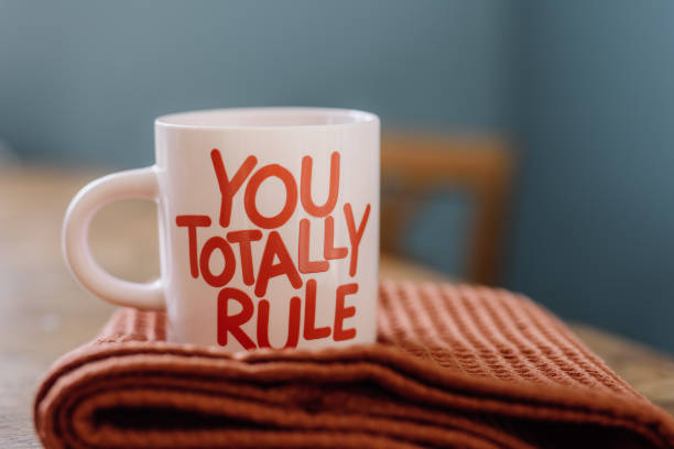 istock Coffee cup with red text You totally rule 1129834744