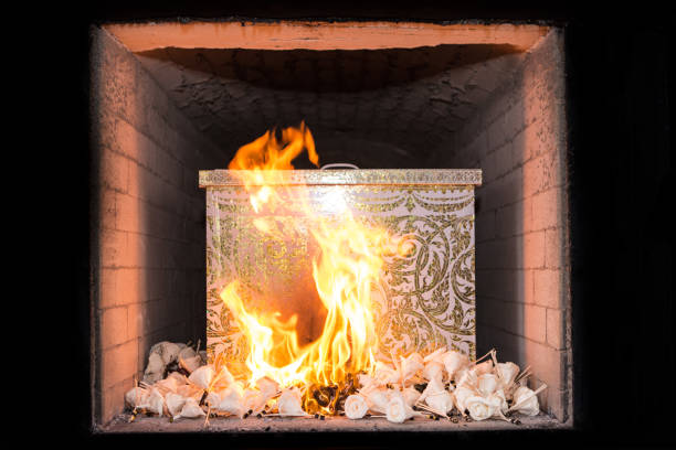 White coffin is burning in the furnace