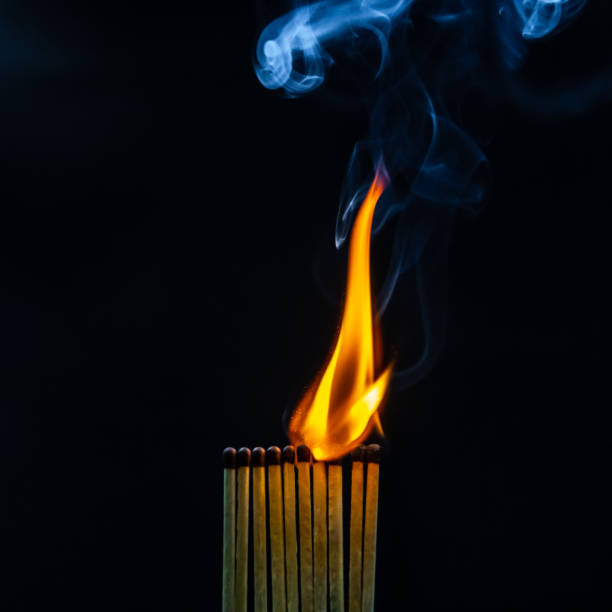 istock Matches, flame, burn, smoke and silhouette 1129836975
