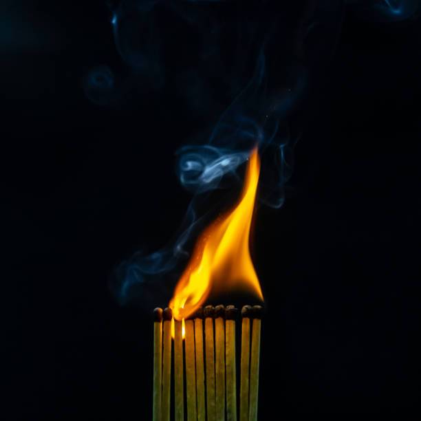 istock Matches, flame, burn, smoke and silhouette 1129837023