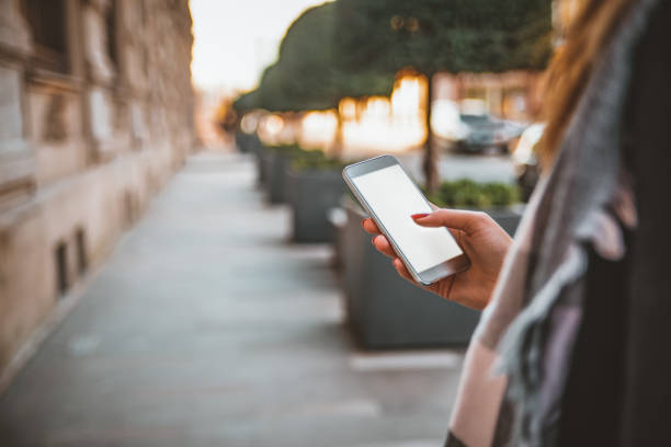 Young cute woman using phone