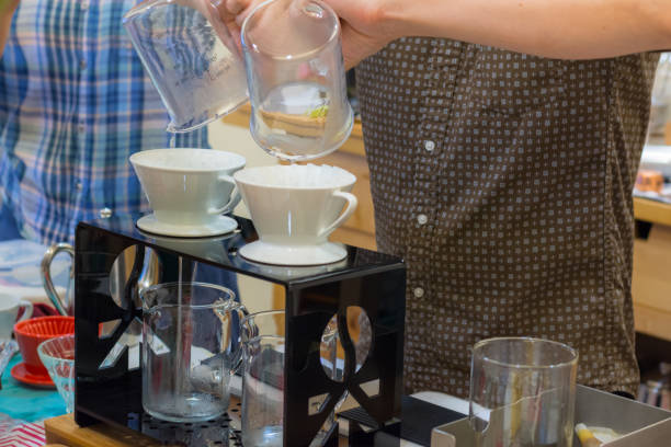 istock Barista hand drip Coffee making Brewing filter Bar Cafe 1129843495