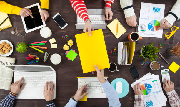 istock Business People Working on an Office Desk 1129844480