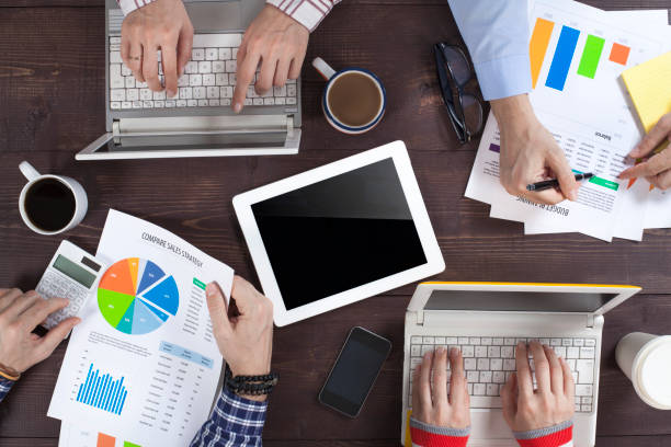 istock Business People Working on an Office Desk 1129844618