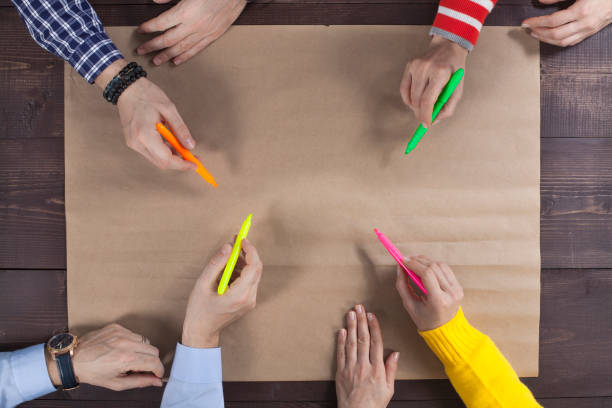 istock Brainstorming group of people working concept 1129844770
