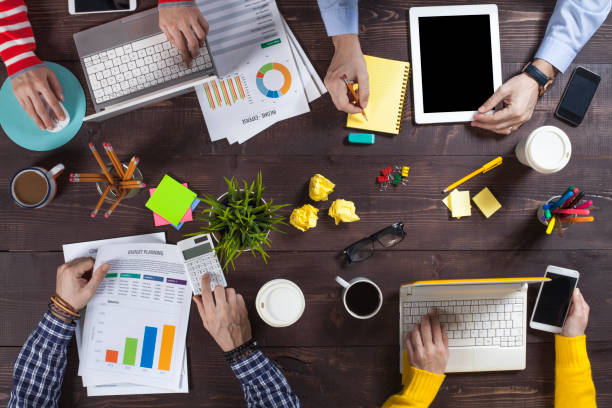 istock Business People Working on an Office Desk 1129845086