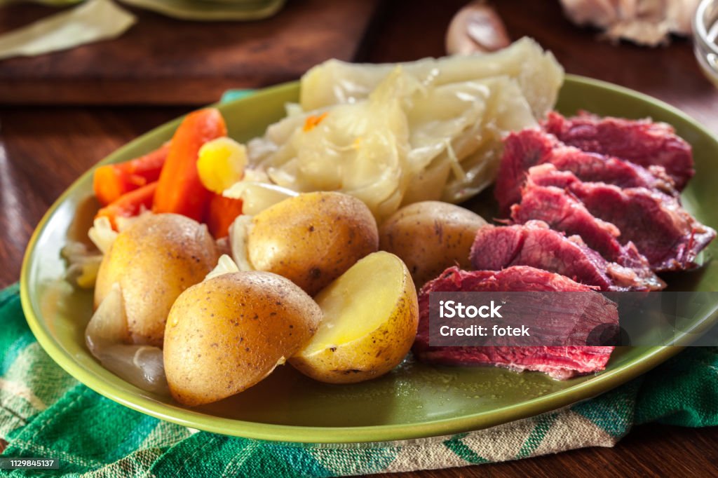 Corned beef and cabbage with potatoes and carrots Corned beef and cabbage with potatoes and carrots on St Patrick's Day Corned Beef Stock Photo