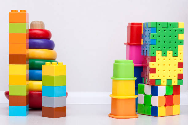 istock Kids education plastic toys, pyramid on the white background. Copy space 1129845216
