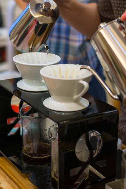 istock Barista hand drip Coffee making Brewing filter Bar Cafe 1129845786
