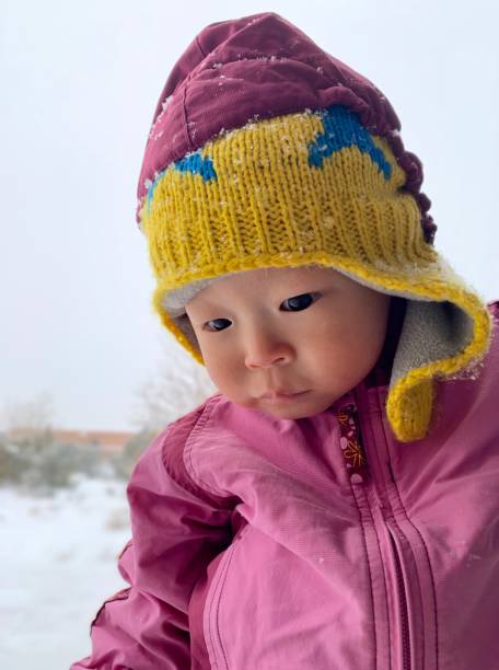 istock Baby in Snow 1129847474