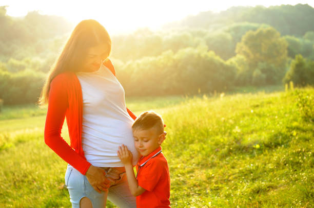 istock Waiting for the baby. Walk in the nature. 1129847557