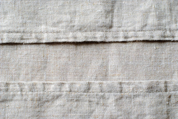 istock Woven linen fabric showing the stitching 1129852756