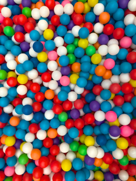 istock Top view colorful plastic balls in a kid playground pool. 1129855087