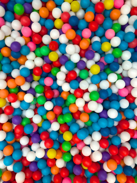 istock Top view colorful plastic balls in a kid playground pool. 1129856046