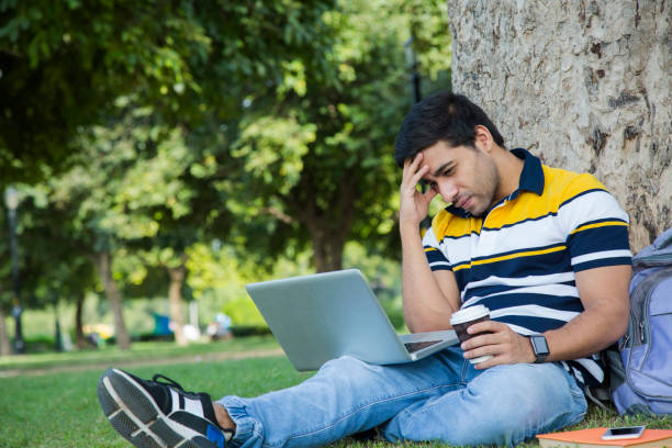 istock College student outdoor - Stock image 1129857567