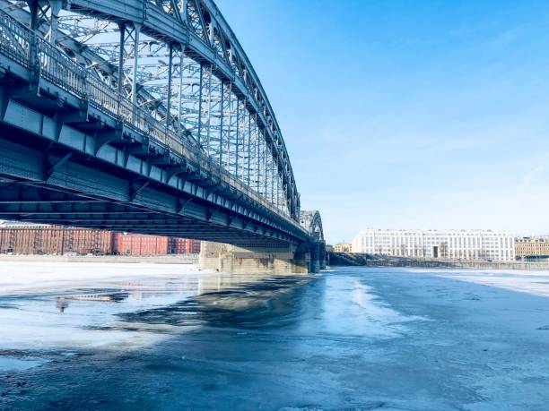 istock Brigde over frozen water 1129859085