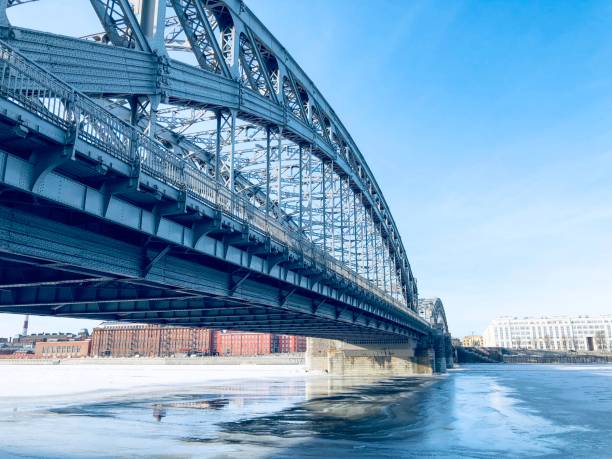 istock Brigde over frozen water 1129859142