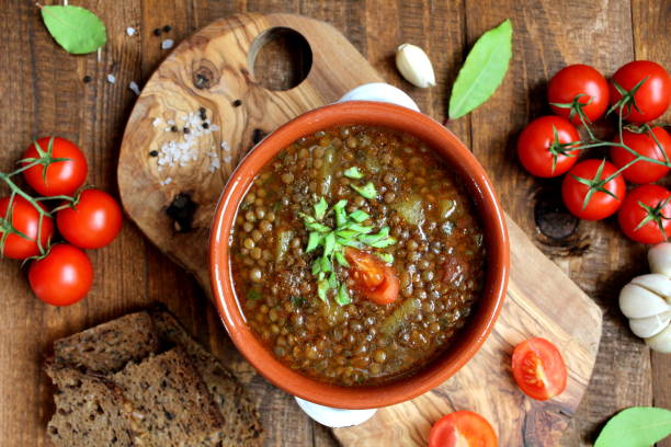 istock Delicious lentil soup on table. 1129859588