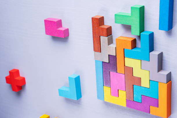 istock Geometric shapes on a wooden background. 1129860745