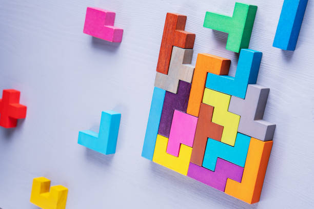 istock Geometric shapes on a wooden background. 1129860746
