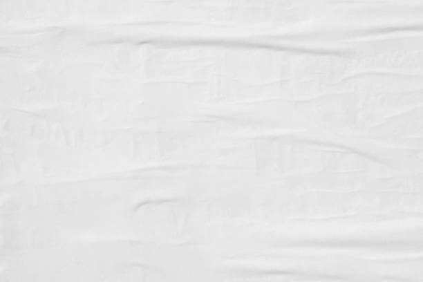 istock Blank white old ripped torn paper crumpled creased posters grunge textures backdrop backgrounds surface placard 1129863721
