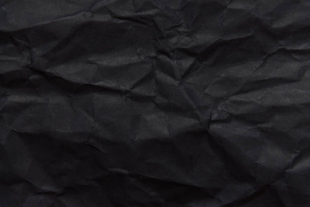istock The background paper, crumpled black 1129864519