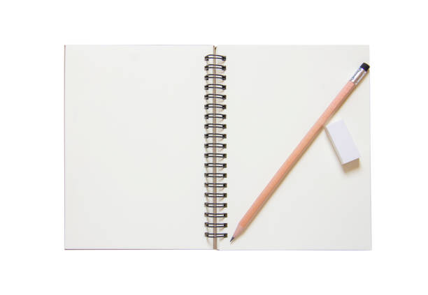 istock Book with pencil isolated white background 1129864766