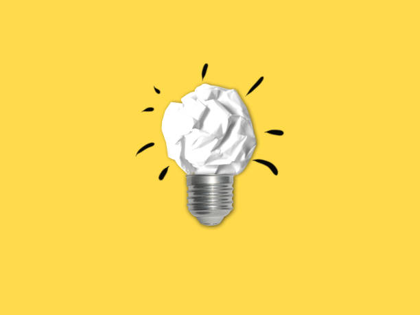 istock Idea light bulb success inspiration crumpled paper isolated background 1129866695