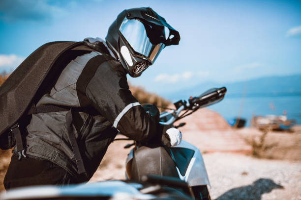 istock Motorcyclist Will Full Protection Equipment 1129866874