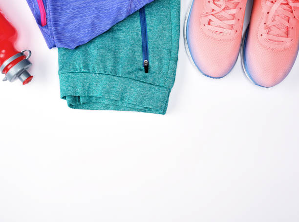 istock sportswear and pink sneakers with laces 1129870670