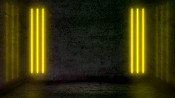 istock Empty dark abstract room with yellow fluorescent neon lights. 1129870857