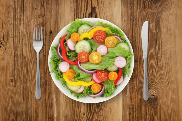 istock Garden Salad on Wood 1129871510