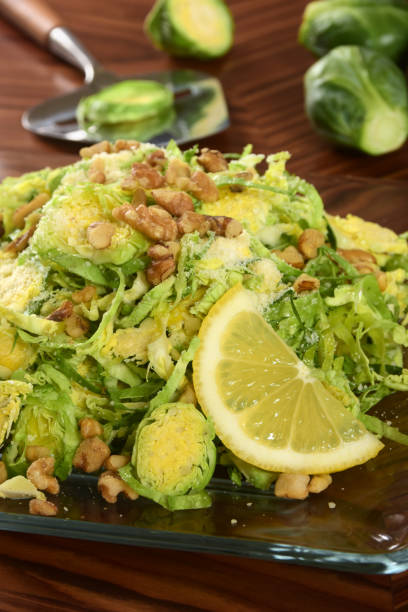 istock Shaved Raw Brussels Sprout Salad with Walnuts 1129872036