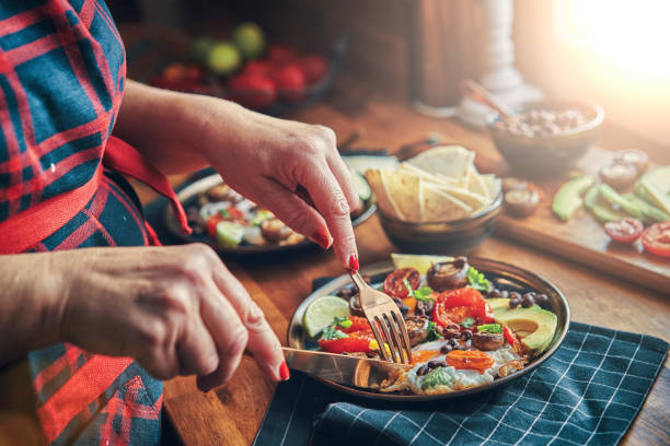 istock Mexican Style Breakfast with Eggs, Mushrooms, Beans, Tomatoes, Avocado and Tortilla 1129879837