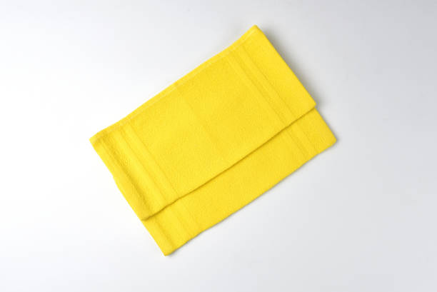 istock Yellow napkin on a white background 1129884690