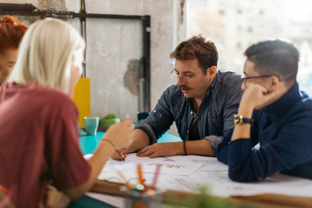 istock Discussing and planing in the office 1129886150