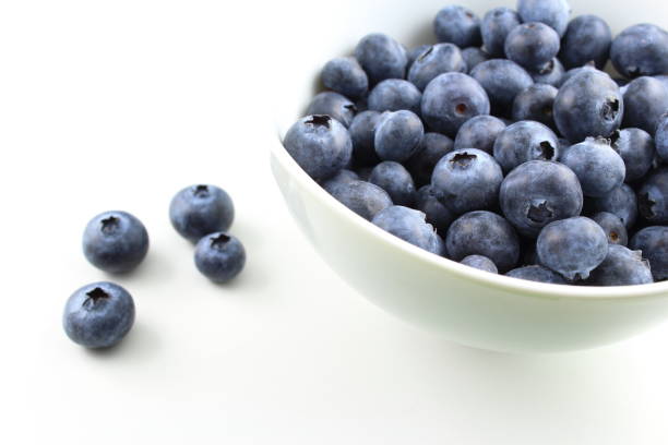 istock fresh blueberry fruits in a small white bowl 1129886678