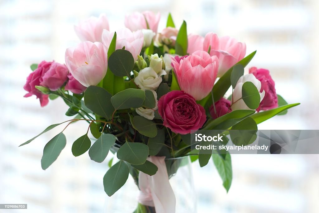 Rose bouquet Beautiful roses bouquet with pink tulips Peony Stock Photo