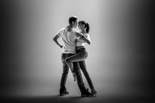istock couple dancing social danse 1129886746