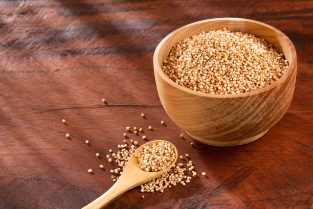 istock Popped amaranth grain - Amaranthus. Wooden background 1129890016