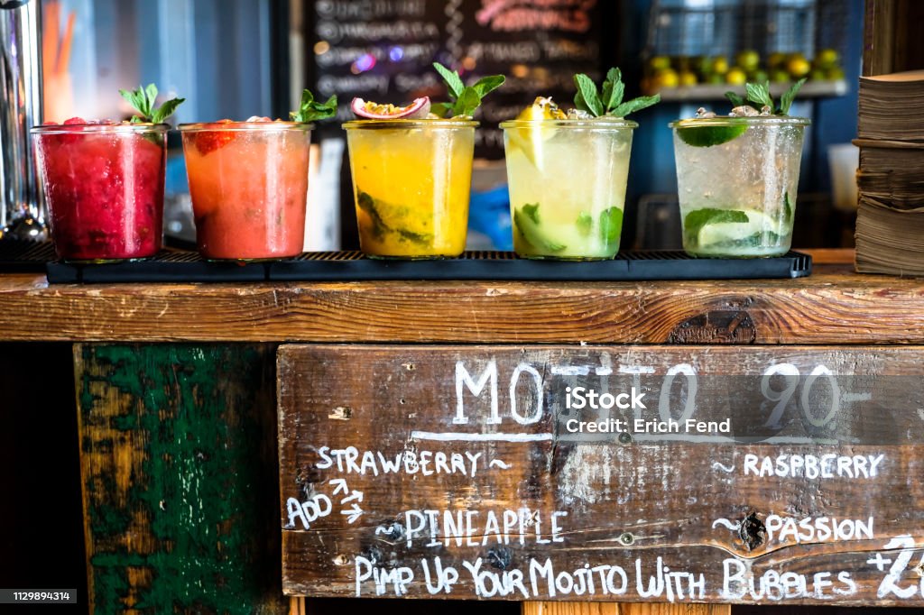 Tropical colorful mojito at a wooden bar ´drinks at the bar counter Cuba Stock Photo