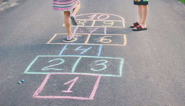 istock street children's games in classics. Selective focus. 1129898697