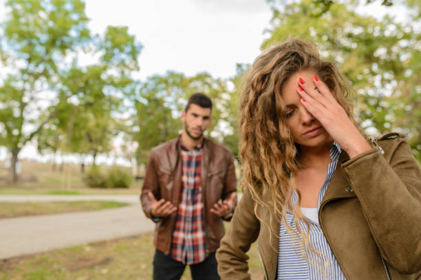 Beautiful girl feels disappointment in love stock photo