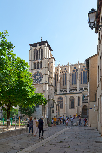 Lyon, France - June 10 2018: Lyon Cathedral (French: Cathédrale Saint-Jean-Baptiste de Lyon) is a Roman Catholic church located on Place Saint-Jean. The cathedral is dedicated to Saint John the Baptist, and is the seat of the Archbishop of Lyon.
