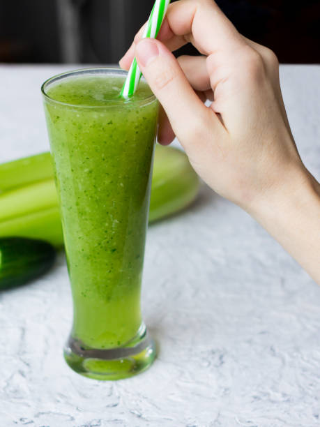istock Green smoothie of fresh celery and cucumber. 1129933460
