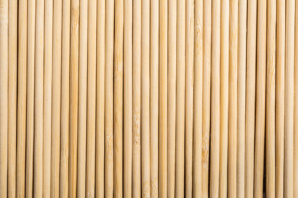 istock Round wooden sticks background. Close-up Wall Pattern 1129956191