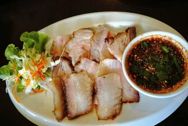 istock Grilled pork with thin slices served with thai salsa  - delicious 1129971617